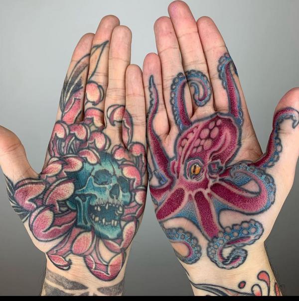 Skull chrysanthemum and octopus palm tattoo