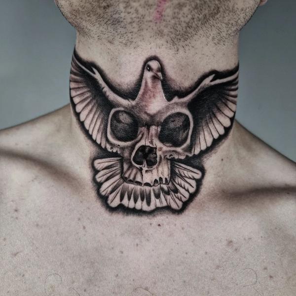 Skull dove neck tattoo