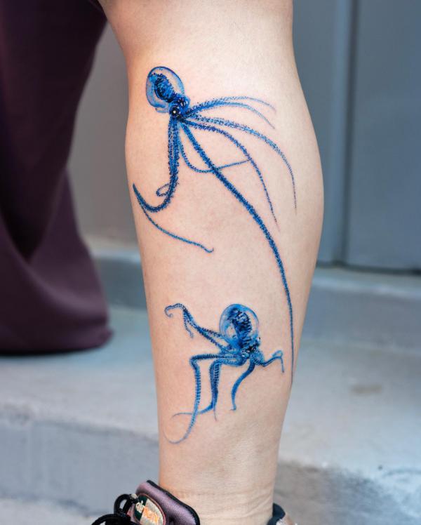Small watercolor octopus tattoo