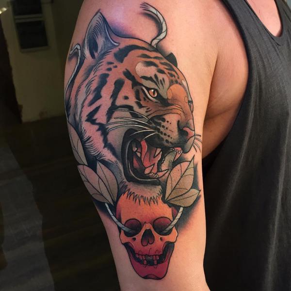 Tiger head with a human skull traditional
