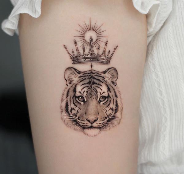 Tiger with crown tattoo