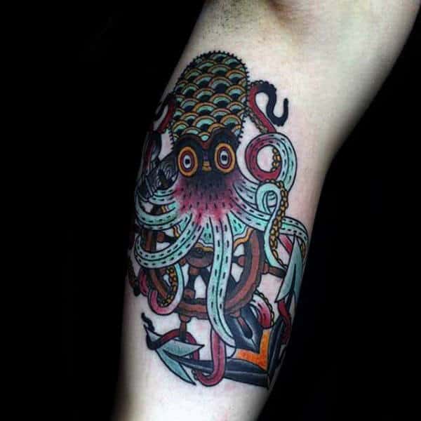 Traditional octopus with anchor arm tattoo