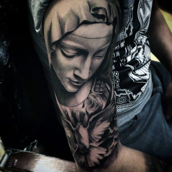 Virgin Mary and dove half sleeve tattoo