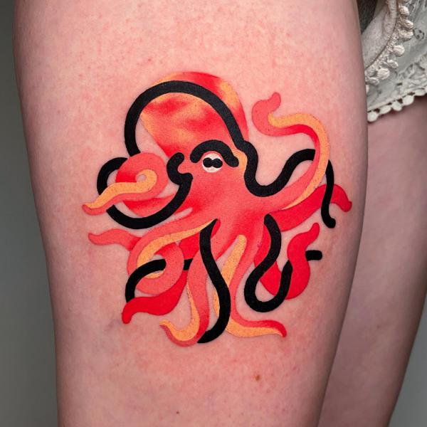Watercolor octopus with black outline tattoo