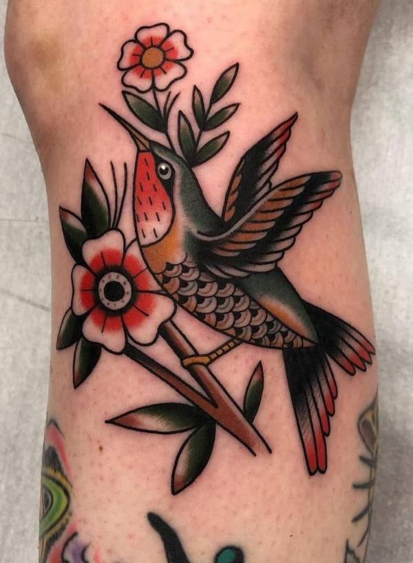 American traditional hummingbird with flowers tattoo