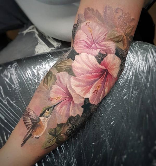 Hummingbird and lily tattoo