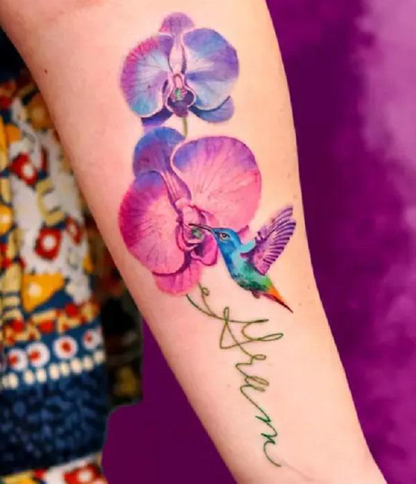 Hummingbird and orchid tattoo