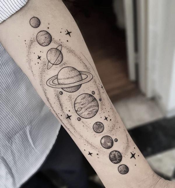 Dotwork solar system tattoo forearm