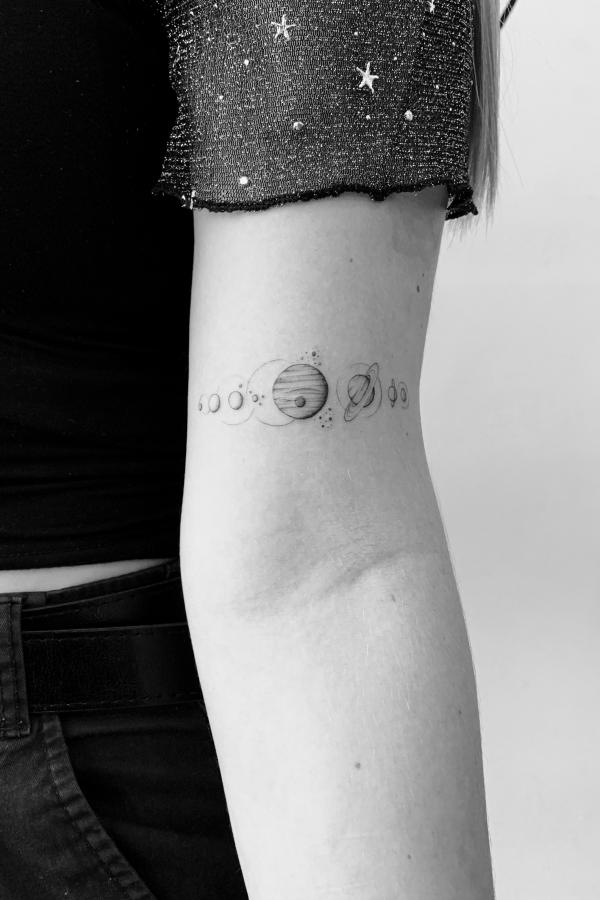 Minimalist solar system tattoo black and grey
