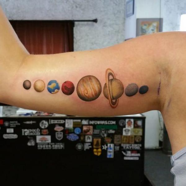 Realistic solar system bicep tattoo