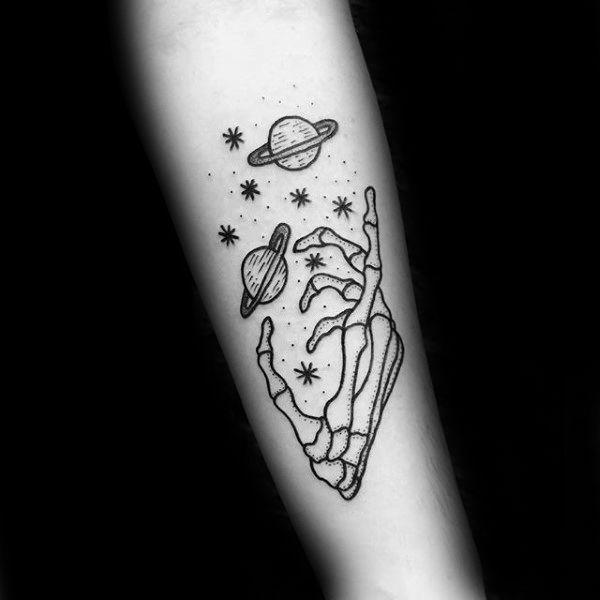Skeleton hand holding solar system tattoo