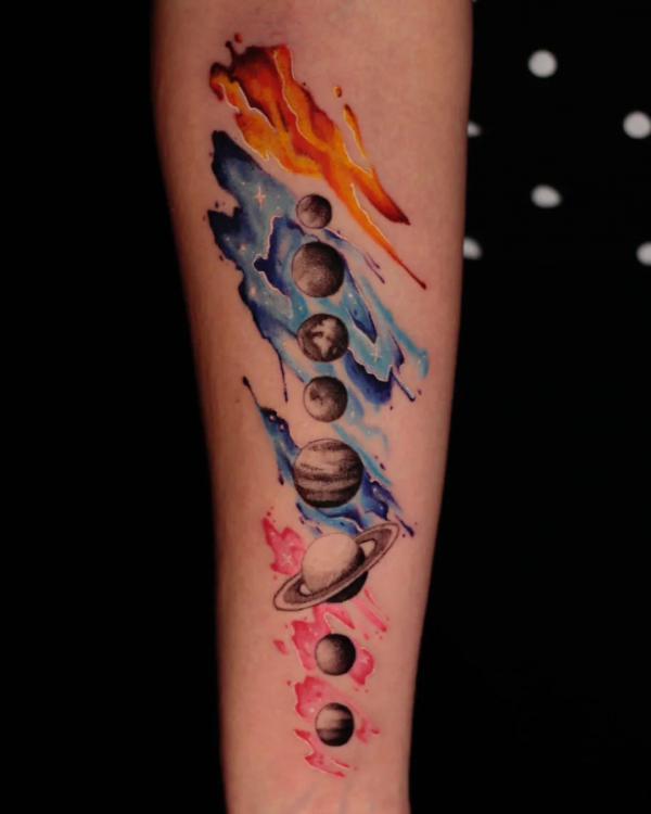 Watercolor solar system inner forearm tattoo