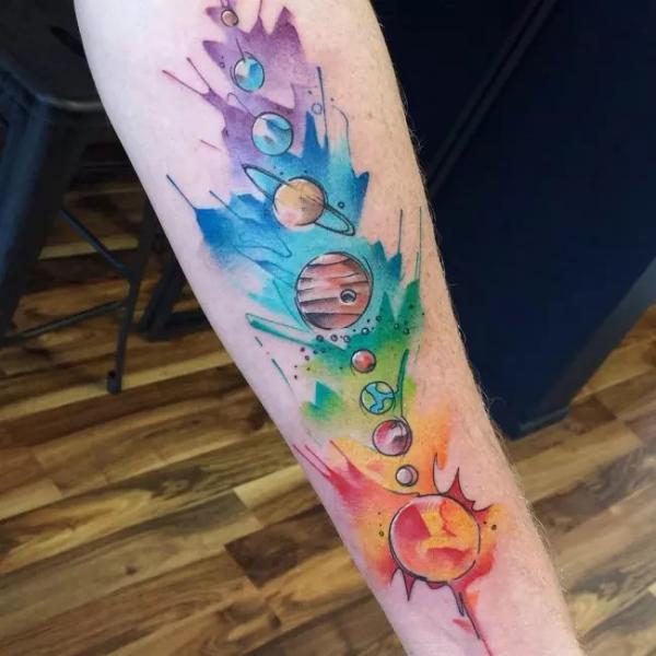 Watercolor solar system tattoo