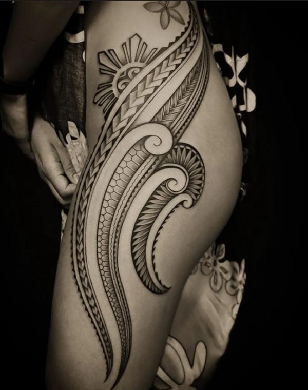 Black and grey tribal thigh tattoo for women