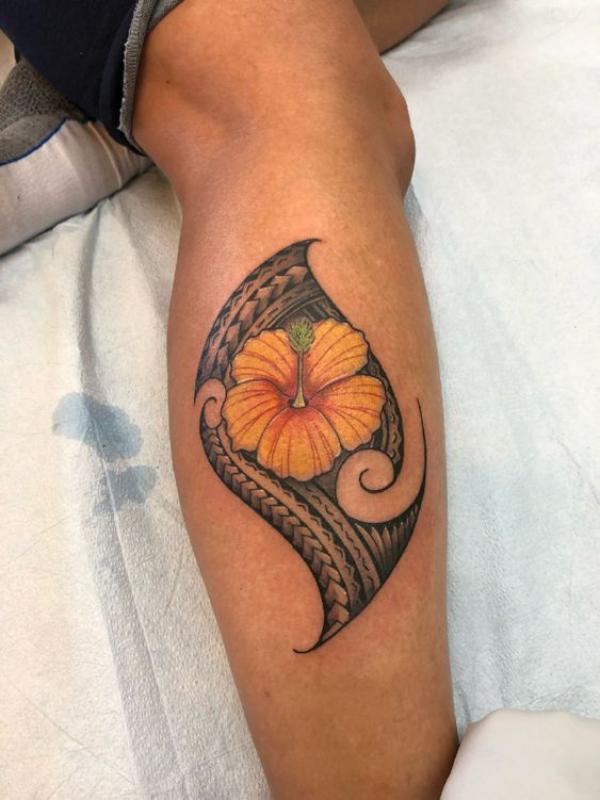 Tribal hibiscus flower calf tattoo for women