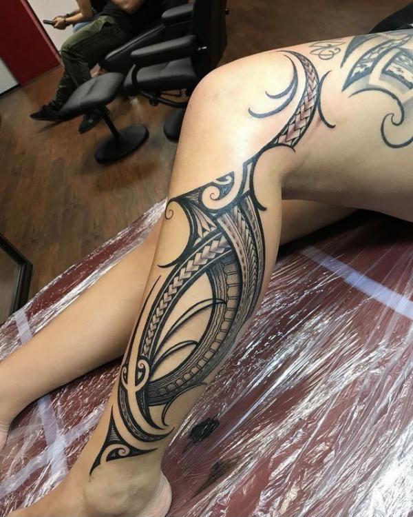Tribal leg tattoo for women