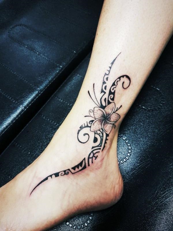 Tribal plumeria ankle tattoo for women