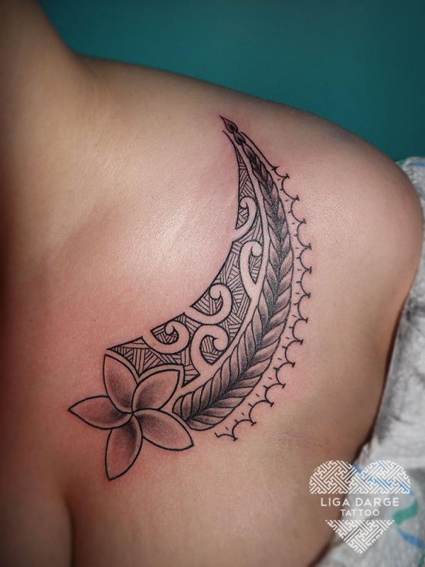 Tribal plumeria clavicle tattoo for women