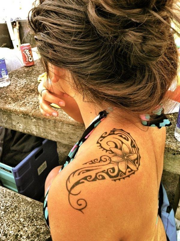 Tribal plumeria shoulder tattoo for women