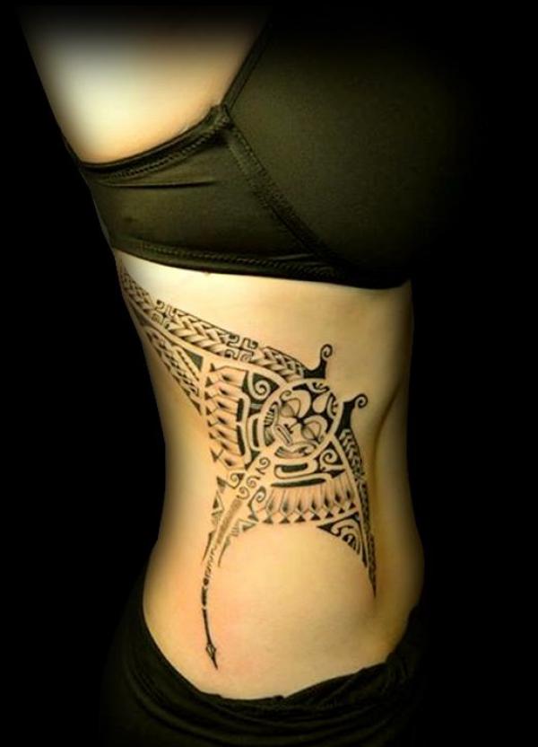 Tribal ray side tattoo for women