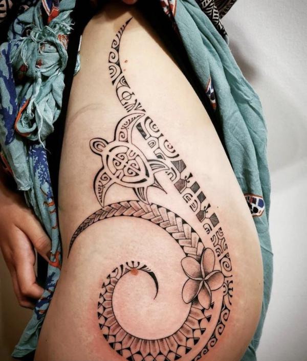 Tribal turtle and flower hip tattoo for women