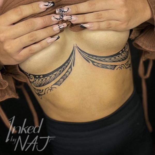 Tribal under boob tattoo for women