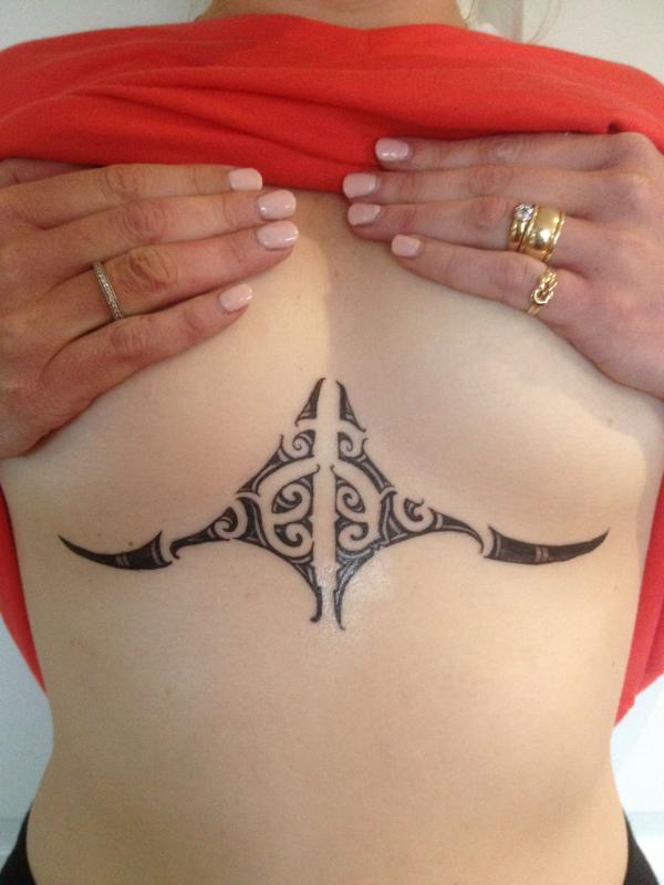 Under boob tribal tattoo for women