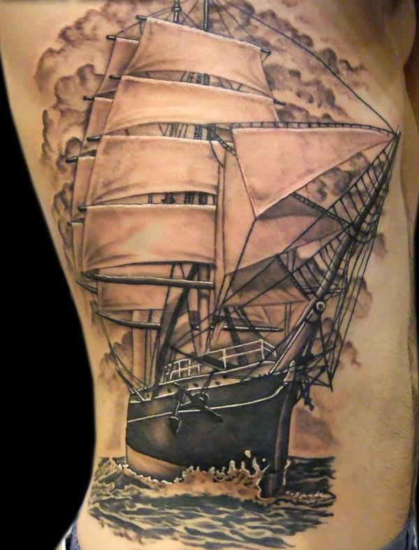sailboat on waves tattoo