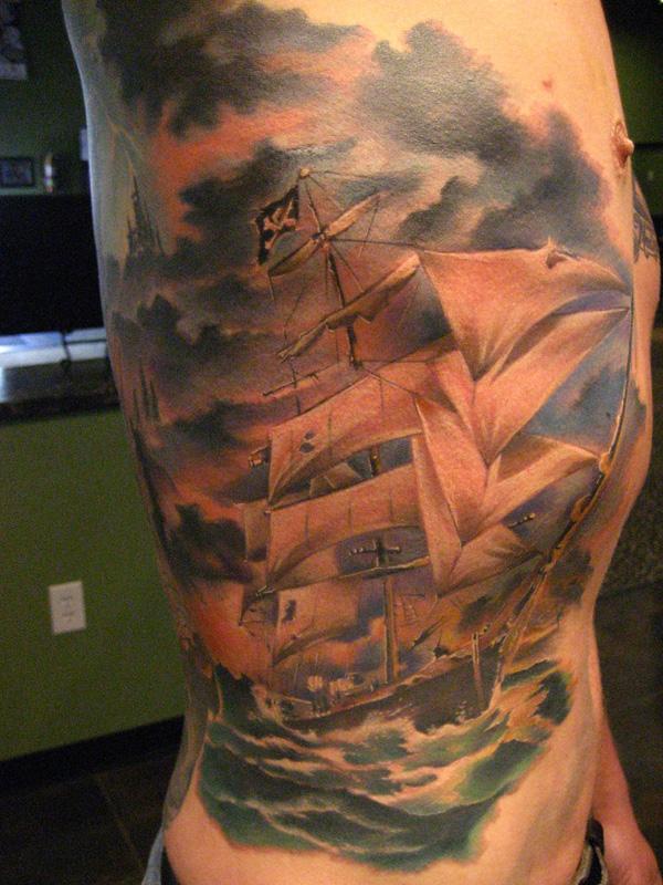 sailboat on waves tattoo