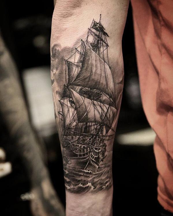 Forearm pirate ship tattoo