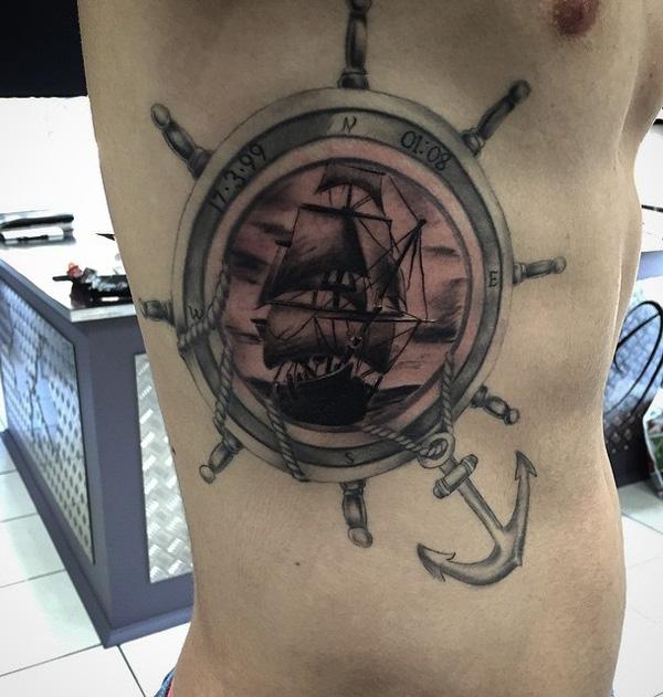 Ship helm tattoo