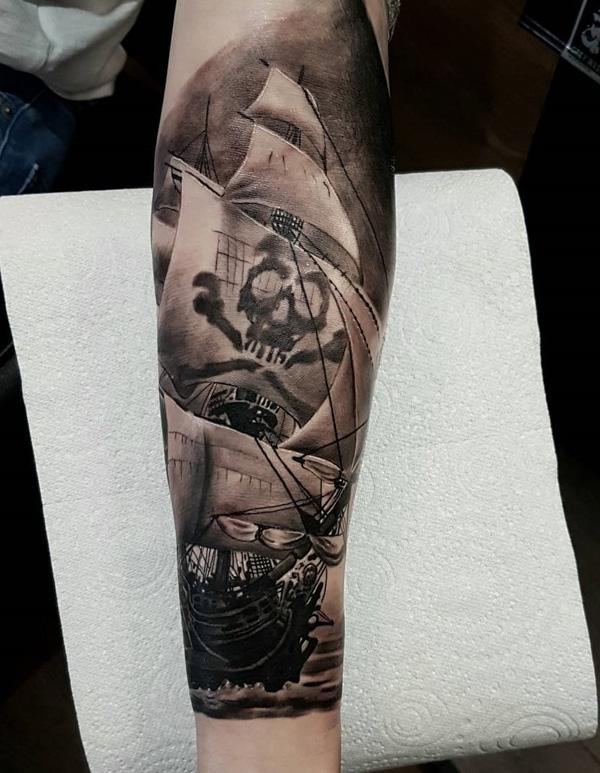 Pirate ship forearm tattoo