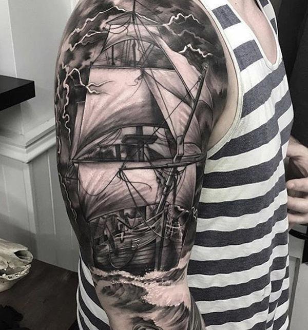 Ship in lightning storm tattoo