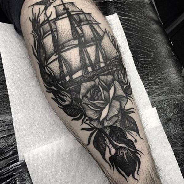 Sailboat with rose tattoo black and grey