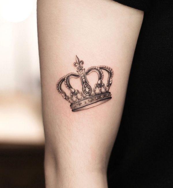 Golden crown tattoo design
