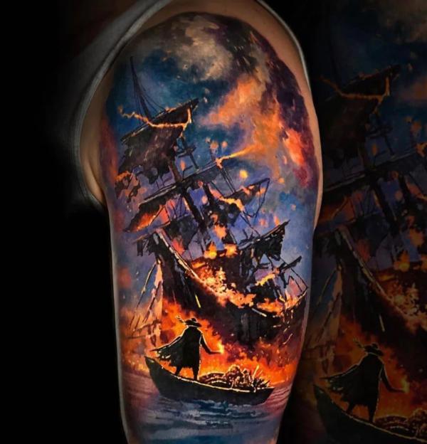 Lifelike burning ship half sleeve tattoo
