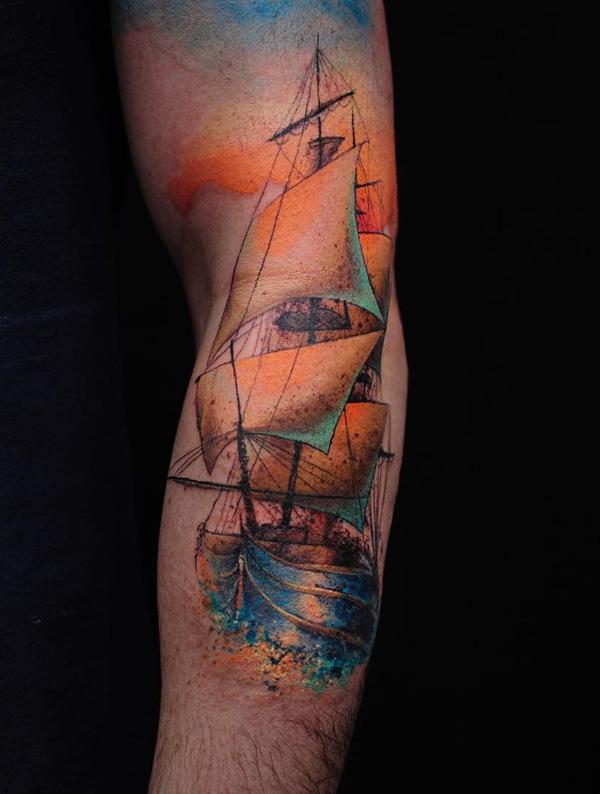 Watercolor seascape boat sleeve tattoo 