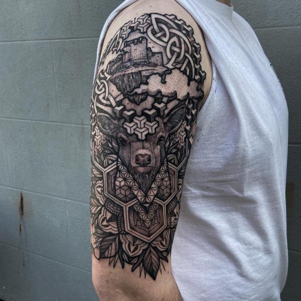Celtic deer arm tattoo