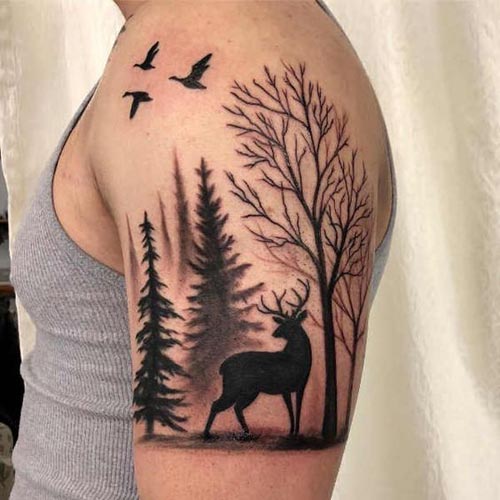 Deer in forest tattoo