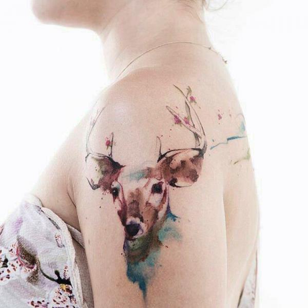 Watercolor feminine deer tattoo