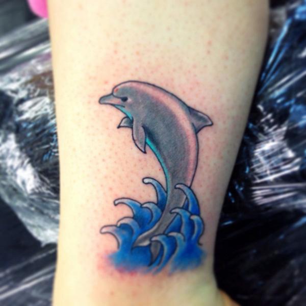 24 Attractive Dolphin Tattoos On Foot