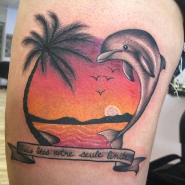 Beach dolphin and palm tree tattoo traditional