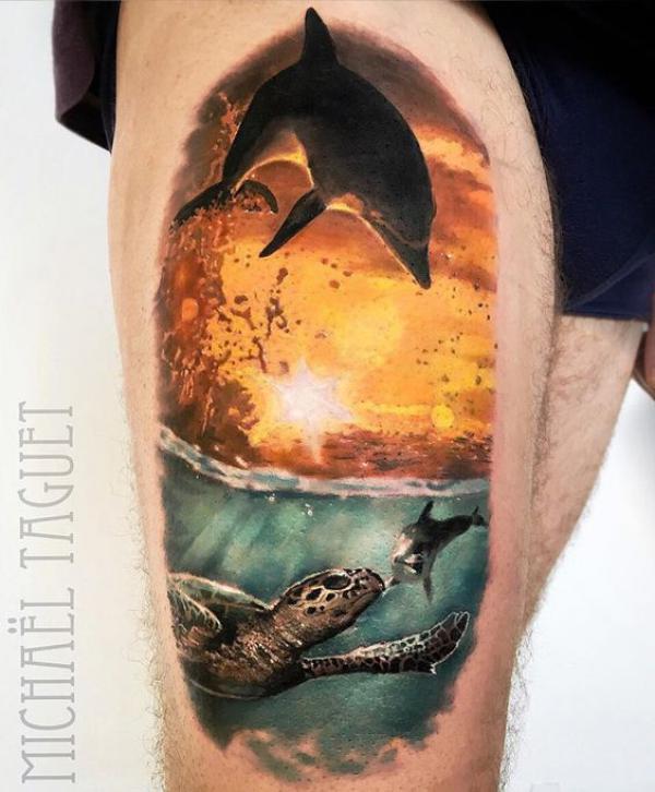 Diving dolphin and sea turtle tattoo