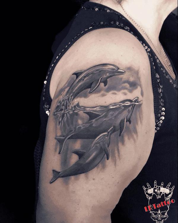 Dolphin and ray tattoo