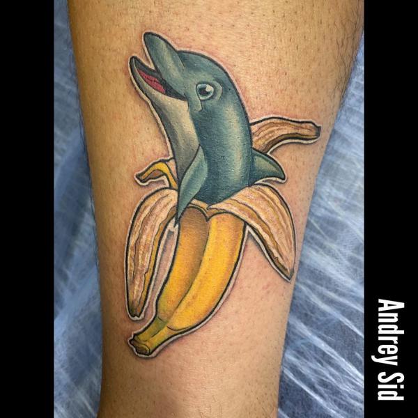 Dolphin banana tattoo