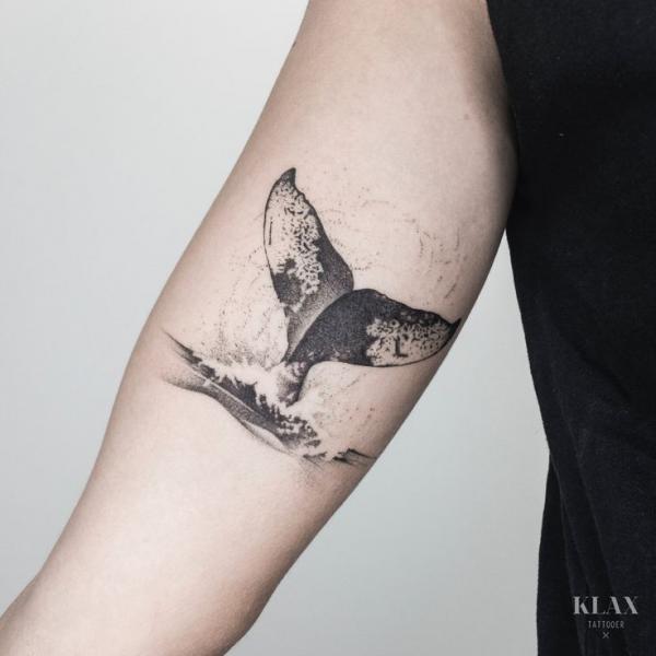 Dolphin tail tattoo