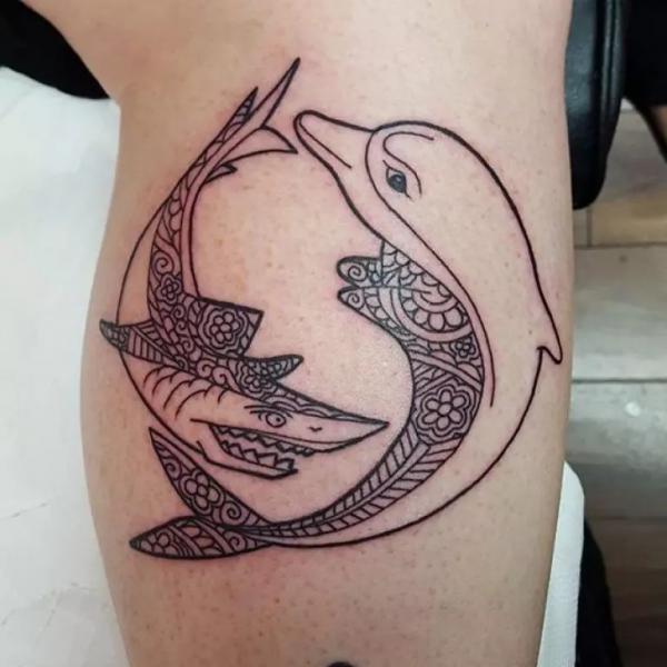 Fine line dolphin and shark tattoo