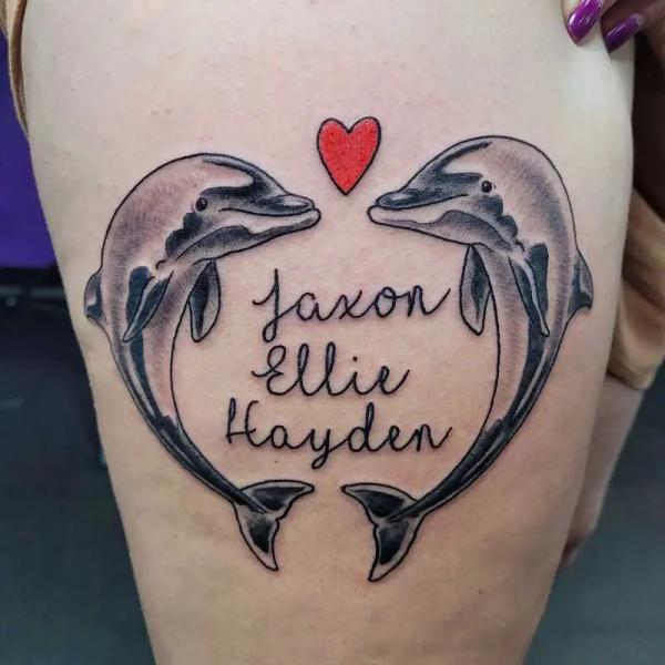 Love heart dolphin tattoo with names