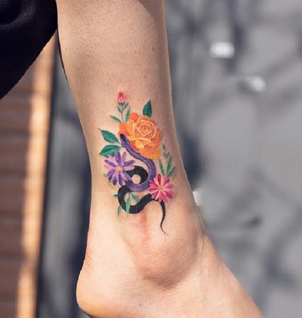 Snake and rose flower ankle tattoo