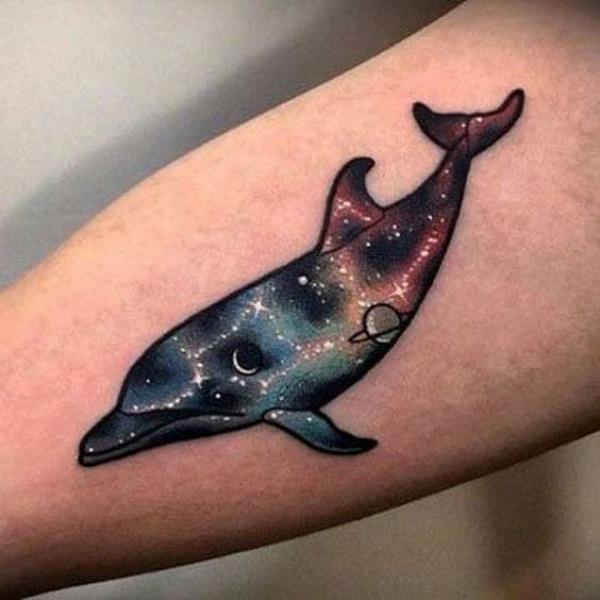 Starry constellation dolphin tattoo